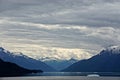 Endicott Arm, Alaska, USA: Distant view of a valley under a cloudy sky in the Endicott Arm Royalty Free Stock Photo