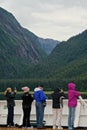 Endicott Arm, Alaska, USA: Tourists on a cruise ship view spectacular scenery Royalty Free Stock Photo