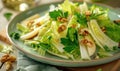 Endive leaves with walnut and apple salad on a pastel green plate Royalty Free Stock Photo