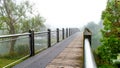 Endless bridge mist over lake