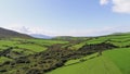 The endless green grass fields of Ireland Aerial view over typical landscape