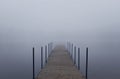 Endless jetty into a fog Royalty Free Stock Photo