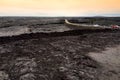 Endless lava fields of the Big Isalnd of Hawaii. Smooth, undulating surface of frozen pahoehoe lava. Royalty Free Stock Photo