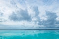 Endless pool, small sea stripe and big blue sky