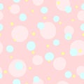 Endless print with repeating coloured round dots. Cute seamless pattern.