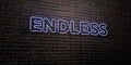 ENDLESS -Realistic Neon Sign on Brick Wall background - 3D rendered royalty free stock image