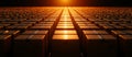 Endless rows of cardboard boxes illuminated by warm sunset light create striking visual organized arrangement evokes sense of Royalty Free Stock Photo