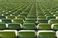 Endless rows of enpty chairs in a stadium