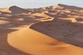 Endless Sands of the Sahara desert. Beautiful sunset over sand dunes of Sahara Desert Morocco Africa Royalty Free Stock Photo