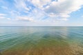 Endless sea and sunny sky with clouds Royalty Free Stock Photo