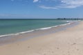 Endless white sand beach with pier In Glenelg, South Australia Royalty Free Stock Photo