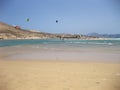 Endless wide tideland in the lagoon with kite surfers of Gorriones, Playa de Sotavento, Costa calma, Fuerteventura, Spain