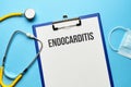 endocarditis diagnosis concept on medical tablet with documents with stethoscope