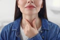 Endocrine system. Woman doing thyroid self examination indoors, closeup Royalty Free Stock Photo