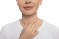 Endocrine system. Woman doing thyroid self examination on white background, closeup Royalty Free Stock Photo