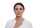 Endocrine system. Young woman doing thyroid self examination on white background Royalty Free Stock Photo
