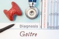 Endocrinology diagnosis Goitre. Figure of thyroid gland, result of laboratory analysis of blood, medical stethoscope and black pen Royalty Free Stock Photo