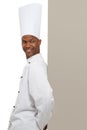 Endorsing your copyspace. A young chef leaning against your copyspace.