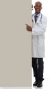 Endorsing your healthcare message. A young doctor holding a blank board reserved for copyspace.