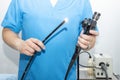 Endoscopy at the hospital. Doctor holding endoscope before gastroscopy. Medical examination Royalty Free Stock Photo