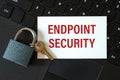 Endpoint Security - the inscription on the card and the lock on the background of the keyboard