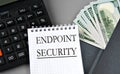 ENDPOINT SECURITY - words on white paper on gray background with calculator and money notes Royalty Free Stock Photo