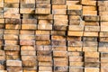 Ends of wooden beams stacked on each other Royalty Free Stock Photo