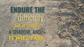 Endure difficulty, for it is only a shadow, it will pass. This strong quote on textured ground promotes resilience Royalty Free Stock Photo