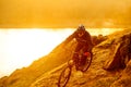 Enduro Cyclist Riding the Mountain Bike Down Beautiful Rocky Trail. Extreme Sport Concept. Space for Text. Royalty Free Stock Photo