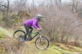 Enduro Cyclist Riding the Mountain Bike on the Rocky Trail.