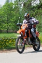 Enduro motorbike riding down the hill, Madona, Latvia, May 26, 2
