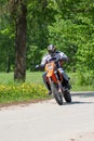 Enduro motorbike riding down the hill, Madona, Latvia, May 26, 2