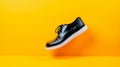 Energetic Black Oxford Shoes On Yellow Background