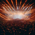 Energetic crowd enjoying a live concert at a music festival Royalty Free Stock Photo