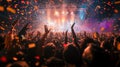 Energetic Crowd Enjoying Live Music Festival at Night Royalty Free Stock Photo