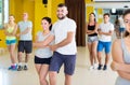 Energetic dancing couples learning salsa Royalty Free Stock Photo