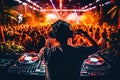 Energetic DJ rocking the crowd at an electrifying music concert - Generative AI