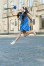 Always energetic. Happy girl in energetic jump outdoors. Energetic mood. Fresh vibes. Music and entertainment. Summer