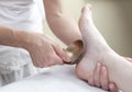 Energetic massage from foot therapy Royalty Free Stock Photo