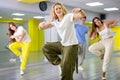 Teenage girl training breakdance Footwork moves in dance hall