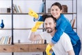 Energetic vigorous couple posing with smile