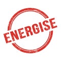 ENERGISE text written on red grungy round stamp Royalty Free Stock Photo