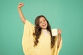 Energize morning. small kid blue background. little girl drink cocoa or milk before sleeping. cosy and fluffy pajama