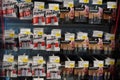 Energizer, Duracell, Eveready AAA, AA Batteries displayed for sale. Batteries of different sizes in promotion blister packs at the