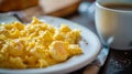 Energizing Breakfast: Indulge in Scrambled Eggs and Coffee with a Captivating Aroma