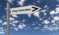 energy conservation traffic sign on blue sky Royalty Free Stock Photo
