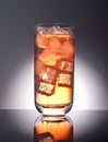 Energy drink with ice and reflection on a gray background Royalty Free Stock Photo