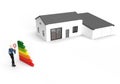 Energy efficiency concept with energy rating chart and a house in background Royalty Free Stock Photo
