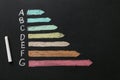 Energy efficiency rating chart and chalk on black background. Space for text Royalty Free Stock Photo