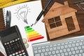 Energy Efficiency Rating - Wooden House Model Royalty Free Stock Photo